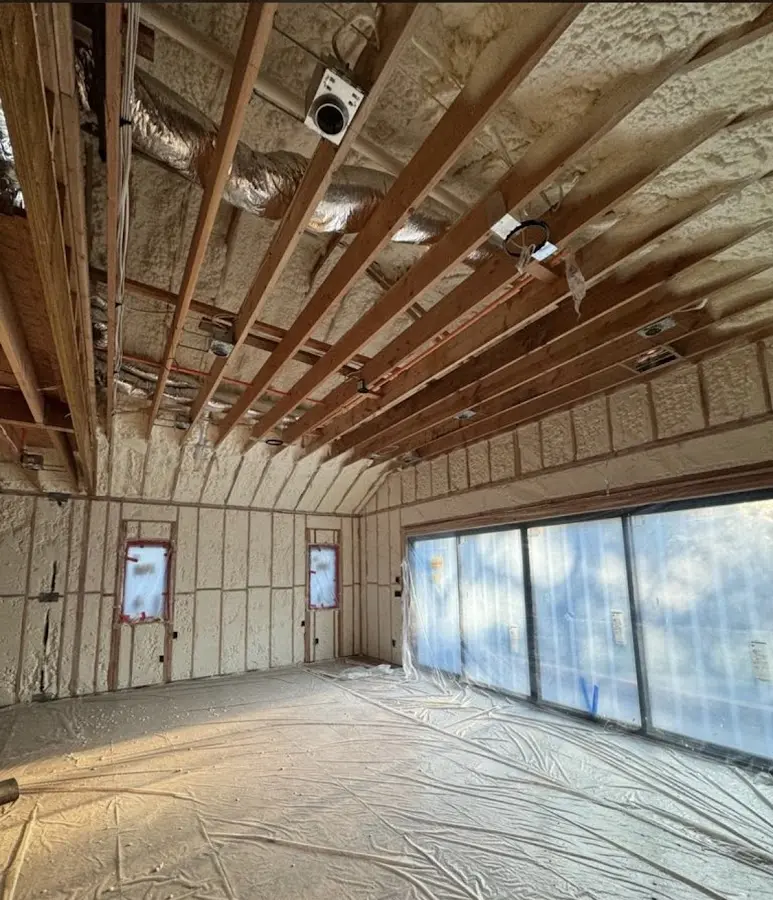 Interior walls and ceiling insulated with spray foam during new construction in Bridgewater